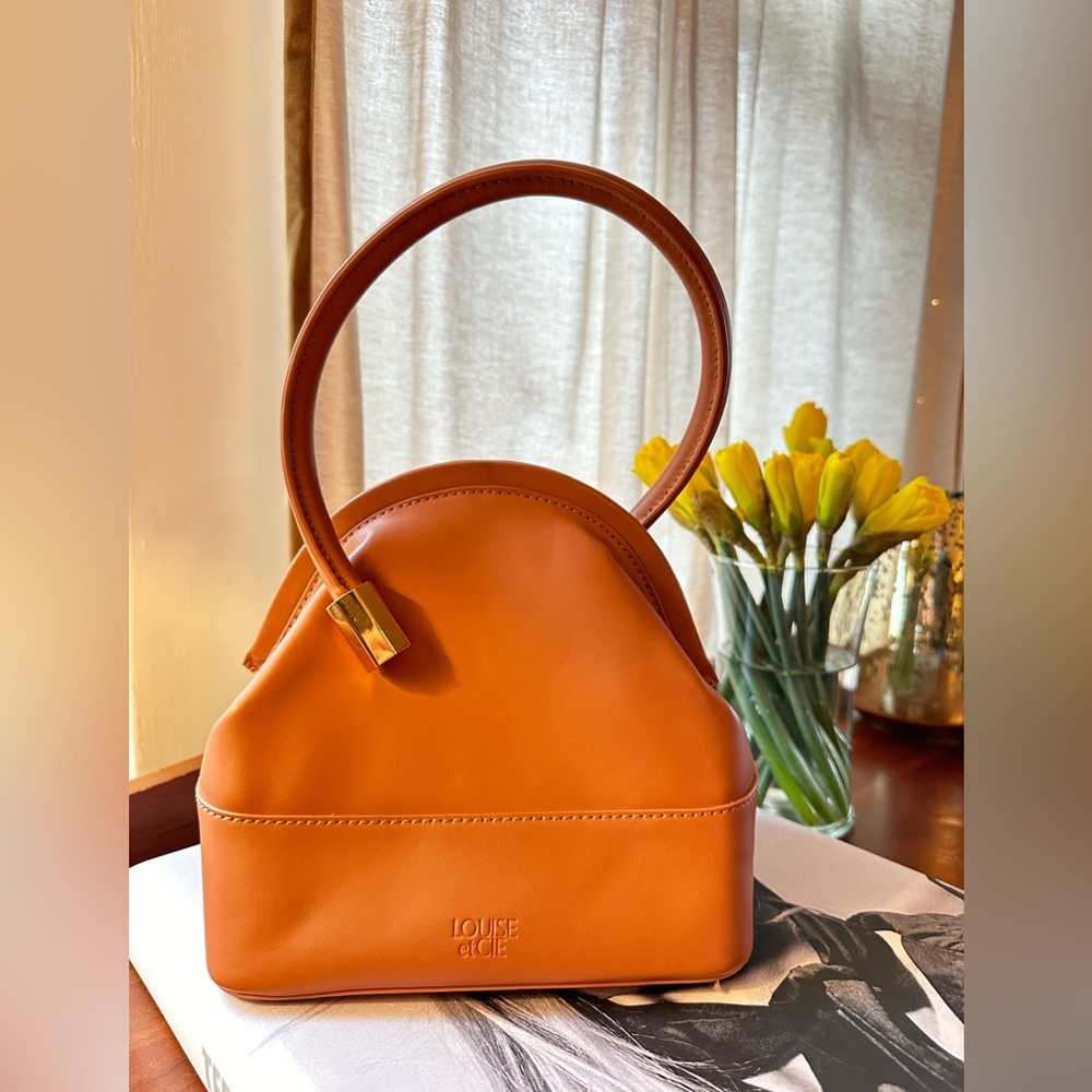 Louise et Cie Isel Leather Pink Carnation Novelty Curved Frame Bucket Bag